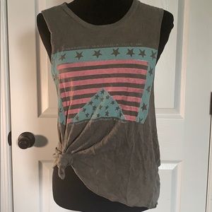 Sleeveless shirt with a flag on it.